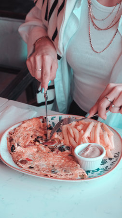 Delicious omelette and breakfast plate on the table.の写真素材