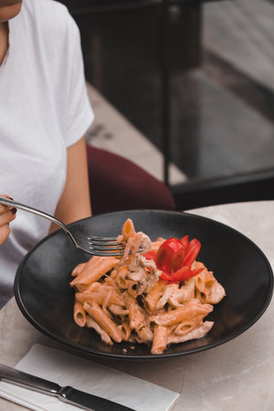 Tasty appetizing classic Italian pasta with a delicious sauce.の写真素材