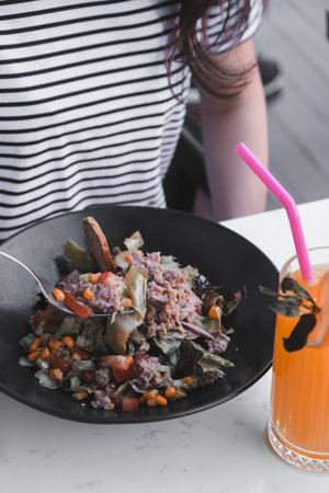 Fresh plate with mixed greensの写真素材