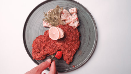 Delicious schnitzel served with french friesの写真素材