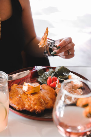 Delicious schnitzel served with french friesの写真素材