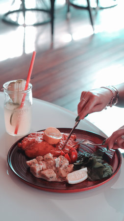 Delicious schnitzel served with french friesの写真素材