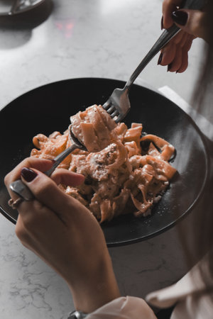 Tasty appetizing classic Italian pasta with a delicious sauce.の写真素材