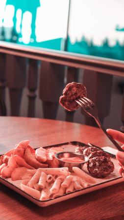 Delicious meatballs with french friesの写真素材