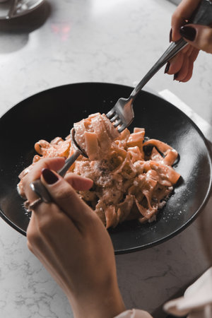 Tasty appetizing classic Italian pasta with a delicious sauce.の写真素材