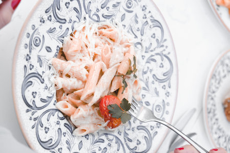 Tasty appetizing classic Italian pasta with a delicious sauce.の写真素材