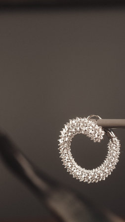 Diamond ring on black background, close-up. Jewelry background