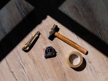 The tools are lying on the laminate. The tools concept.の写真素材