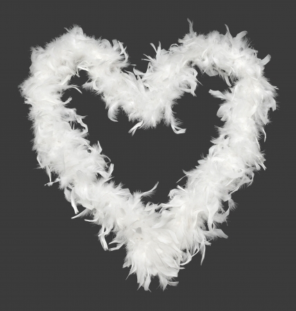 White heart on black backgroundの写真素材