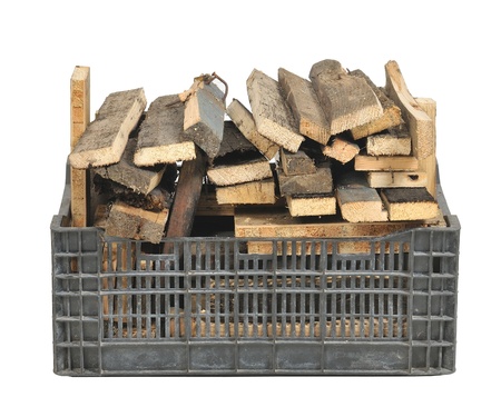 Plastic box with firewoodの写真素材