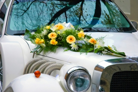Wedding car decorated with flowersの写真素材