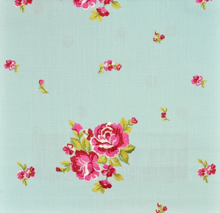 Fragment of fabric with rosesの写真素材
