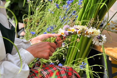 Woman is making a wreathの写真素材