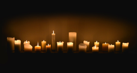 Candles in darkの写真素材