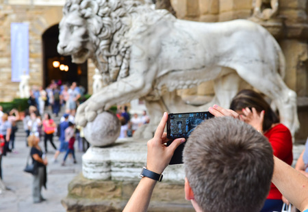 tourist taking pictureの写真素材