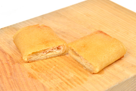 Homemade stuffed pancakes, wrapped with an envelopeの写真素材