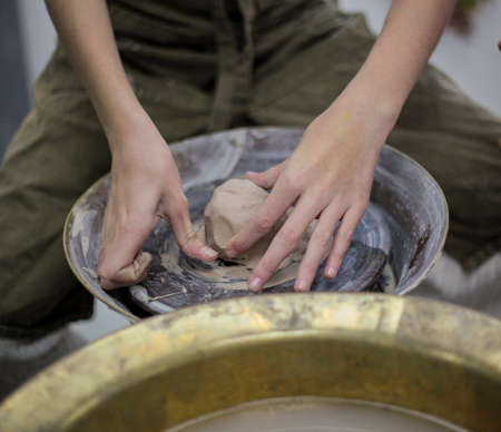 Modeling by hand. Potters wheel. Pottery workshopの写真素材