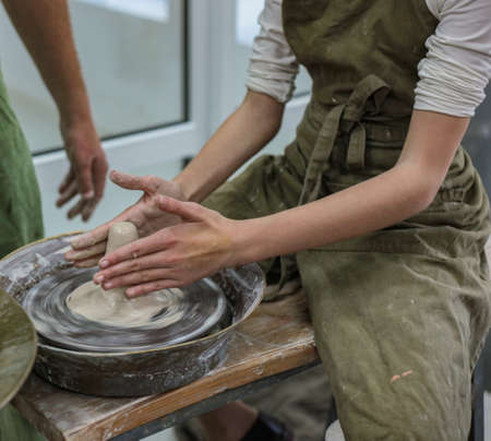 Modeling by hand. Potters wheel. Pottery workshopの写真素材