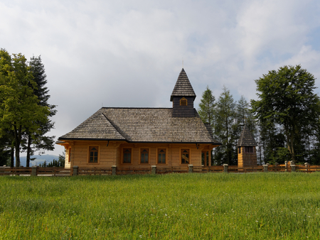 Wooden church in Polish mountains Beskydy onの写真素材