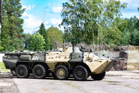 Armored personnel carrier in a military town. Armored vehicle intelligence.