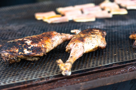 The meat on the grill. Cooking meat by Italian cooks. Meat festival in Tuscany. May 2019.