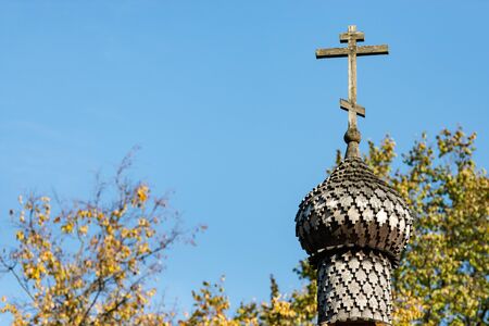 The wooden dome with a cross. Orthodox chapel built entirely of wood.の写真素材