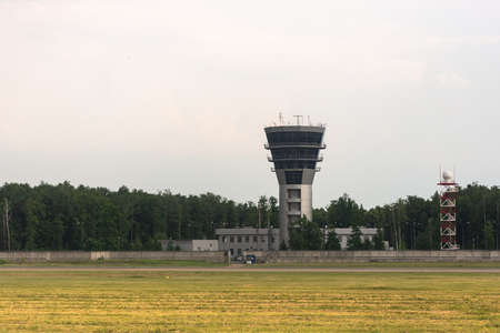 Vnukovo airport. The control tower of the airport Vnukovo. Modern building for flight control.のeditorial素材