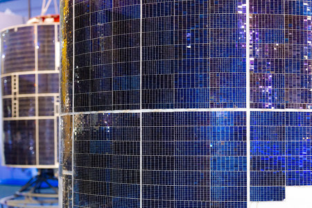 Solar panels on the satellite. Solar panels in a circle around the surface of the satellite.の写真素材