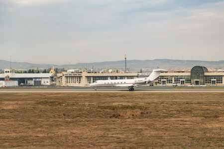 Paphos Airport in Cyprus. Planes on the runway and at the hangars. Aircraft on the upper runway.のeditorial素材