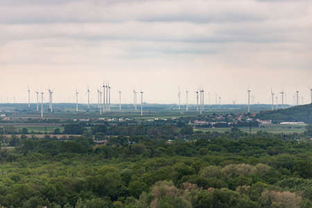 Dozens of wind turbines on the horizon. Austrian fields generate a lot of electricity.の写真素材