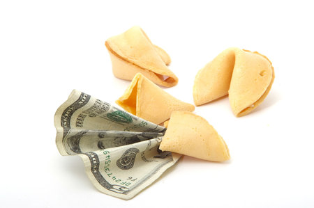 A fortune cookie predicts a positive financial future.の写真素材