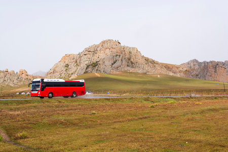 Tourist Bus Rides on the Picturesque mountain highwayの写真素材