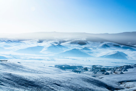 High mountains under snow in the winterの写真素材
