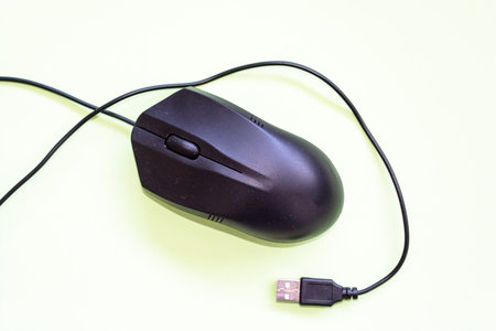 Top view of black computer mouse isolated on white