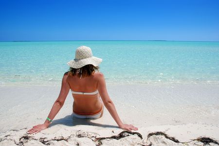 Woman relaxing on beachの写真素材