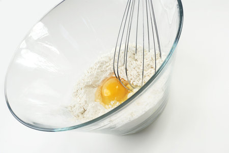 Whisking eggs with flour