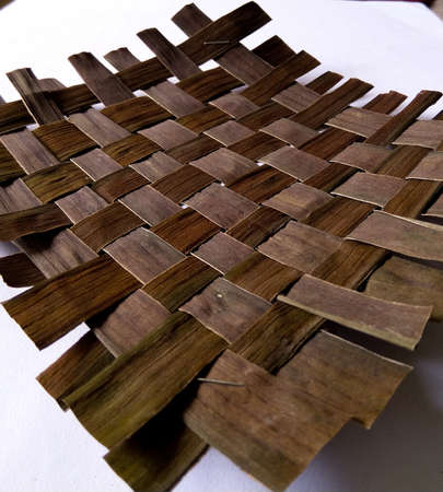 Woven banana leaf texture for background or wallpaperの写真素材
