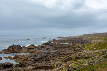 The Atlantic waves in Baiona break against the rocks of the coast and are called Baiona breakwaters.の写真素材