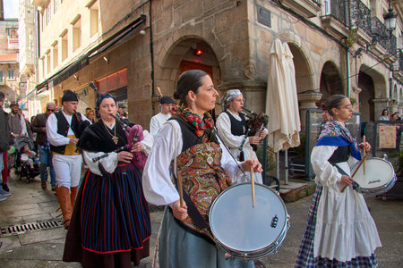 Vigo, Pontevedra, Spain; April 7, 2024; The drum and bagpipe groups do not stop playing during the Reconquest of Vigo festivalのeditorial素材