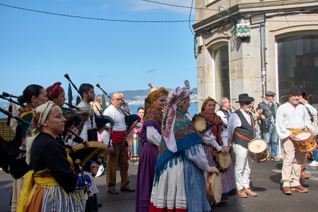 Vigo, Pontevedra, Spain; April 7, 2024; The tambourines do not stop playing during the festivities of the Reconquest of Vigoのeditorial素材