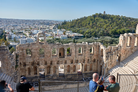 Athens, Greece; October,13,2022;View of the ancient stone arches of the ruins of the Odeon Theater of Herodes Atticus on the Acropolis of Athens. It is a stone structure located on the southwestern slope of the Acropolis of Athens, Greece.のeditorial素材