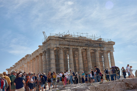 Athens, Greece - October,13,2022: Crowds of tourists visit the Parthenon in the acropolis everyday at sunsetのeditorial素材