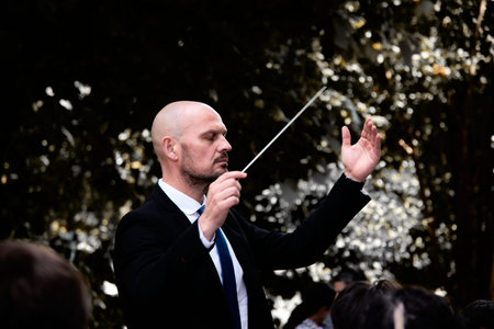 Vigo,Pontevedra,Spain;May,17,2023; The director masterfully conducts the Bembrive music band on the...