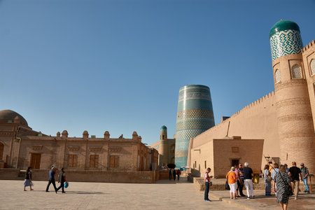Khiva,Uzbekistan; September, 21,2024:Kalta Minor Minaret, a masterpiece of Islamic architecture in the historic city of Khiva, Uzbekistan. Located on the ancient Silk Road, the minaret stands out with its vibrant turquoise tiles and intricate patterns, symbolizing the rich cultural and religious heritage of the region. Built in the 19th century, the Kalta Minor was intended to be the tallest minaret in Central Asia, although it was never completed.の写真素材