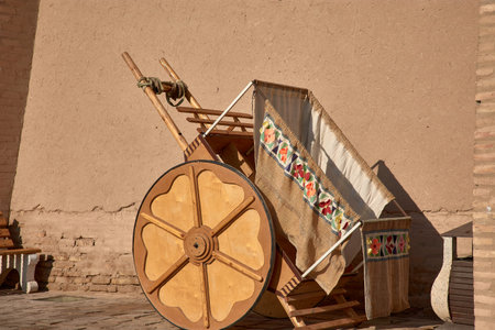 A traditional wooden cart from the historic city of Khiva, Uzbekistan, a key stop along the Silk...