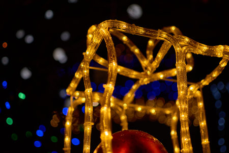 A large, glowing gift box forms part of the famous Christmas lights display in Vigo, Spain. This...