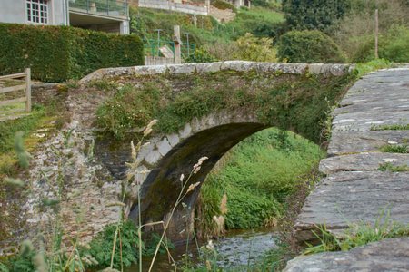 Medieval bridge Ponte do Pasatempo in MondoÃ±edo, Lugo, built with slate masonry and topped with...
