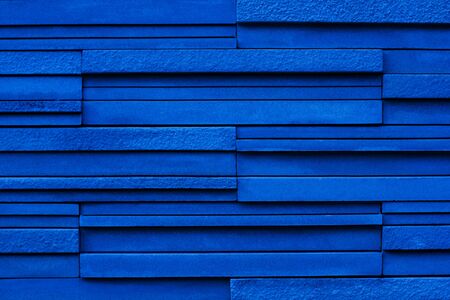 Blue background, long bricks in raw, good patternの写真素材