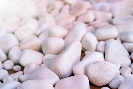 Background of white spa stones at the sun lights, relax concept. copy space.の写真素材