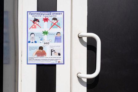 Kiev, Ukraine, March 27, 2020, a sign of safety measures on door from coronavirus, to sit at home...